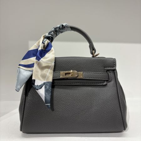 Borsa in pelle e tessuto